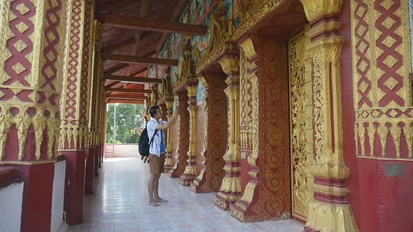Tourist Taking Photo in Temple