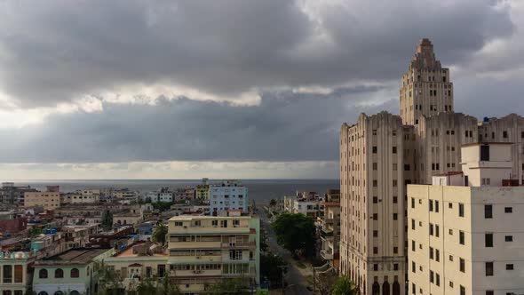 Beautiful Aerial Time Lapse view of the Havana City, Capital of Cuba, during a vibrant cloudy day.