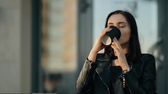Young Attractive Woman Drinking Coffee