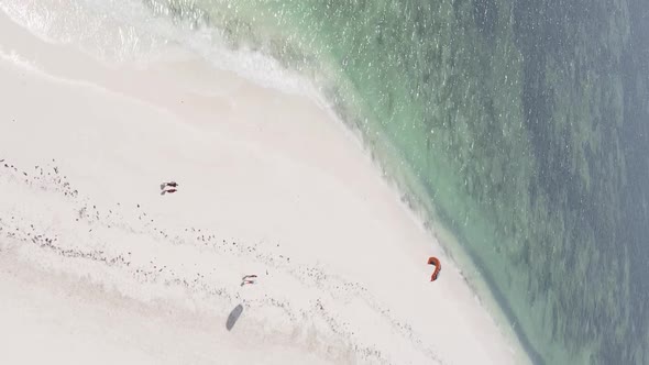 Vertical Video Boats in the Ocean Near the Coast of Zanzibar Tanzania Aerial View