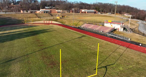 High school college athletic fields. Football soccer running track. Aerial view.