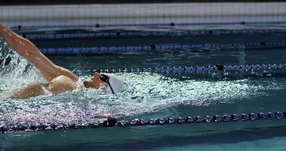 Swimmer training in a swimming pool