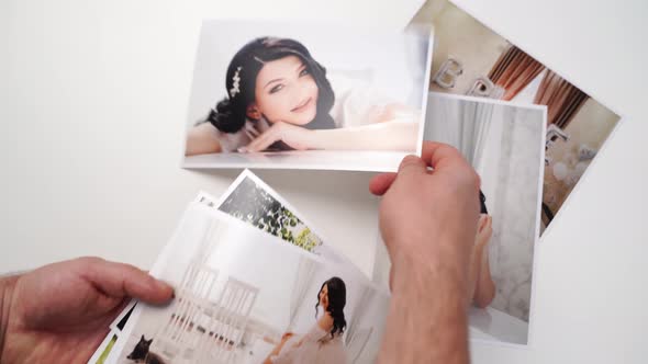 Printed on Paper Photos of a Beautiful Brunette Bride