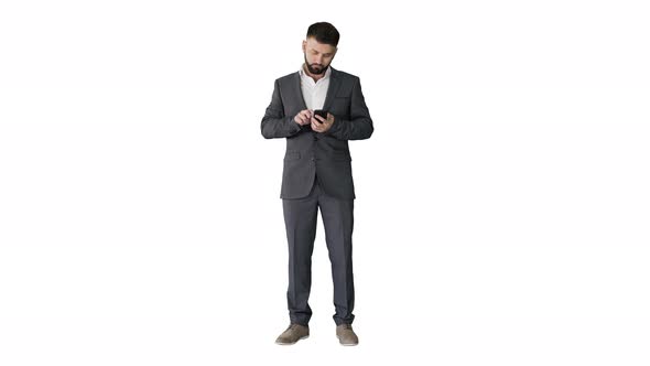 Turk Business Man Texting on His Phone on White Background