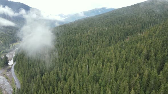 Mountains in Fog Slow Motion. Aerial View of the Carpathian Mountains in Autumn, Ukraine