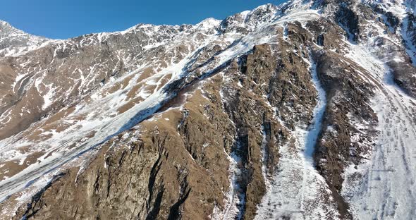 Aerial view of beautiful snowy mountains near Kazbegi, Georgia