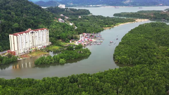 Aerial landscape drone fly around riverside dindings pantai desair apartment an kampung lumut kiri f