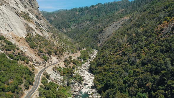 River & Road In The Valley