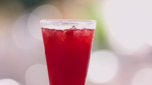 Fresh Pomegranate Juice in Glass Cup.