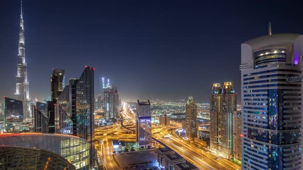 Dubai Downtown Skyline Night Timelapse with Tallest Building and Sheikh Zayed Road Traffic UAE