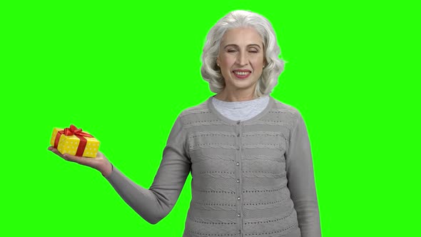 Woman Holding a Gift on Chroma Key Background