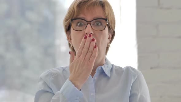 Portrait of Old Woman Gesturing Shock Astonished