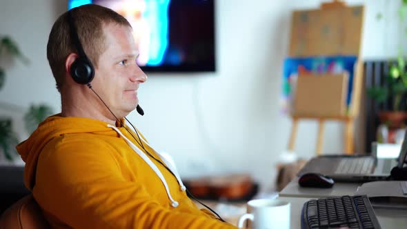 Stay at Home. a Man Works at Home at a Computer During the Coronavirus Pandemic.