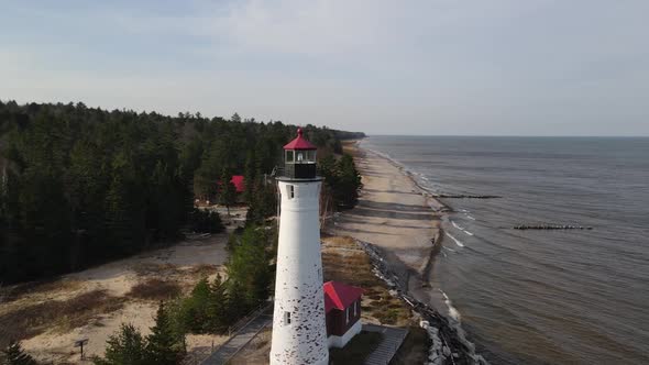 4k drone footage of Crisp Point Lighthouse in Michigan during the fall.