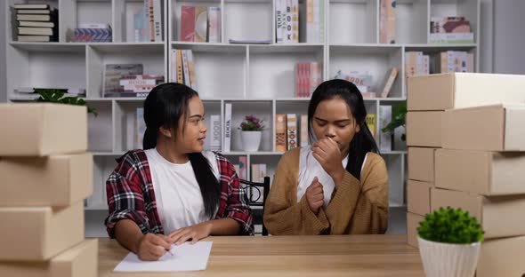 Twin girls working and cough