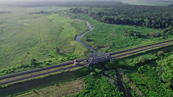 Metal Railway Train Bridge Over the River