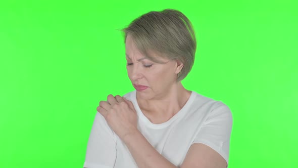 Old Woman Having Toothache on Green Background