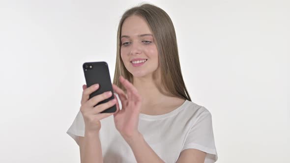 Beautiful Young Woman Talking on Smartphone, White Background