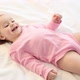 Pretty little girl playing and laughing on bed. Father play with daughter - VideoHive Item for Sale