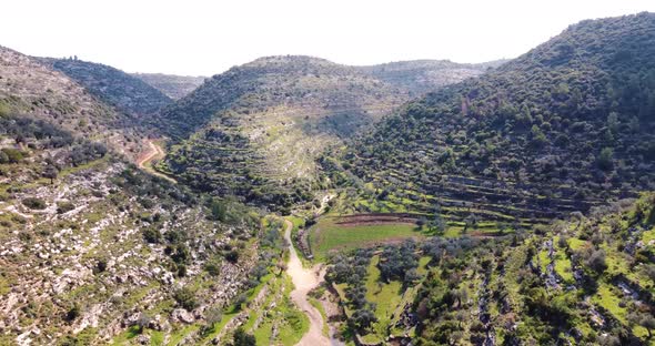 Aerial View of natural formation in the hills with paths, al-Bireh Governorate.