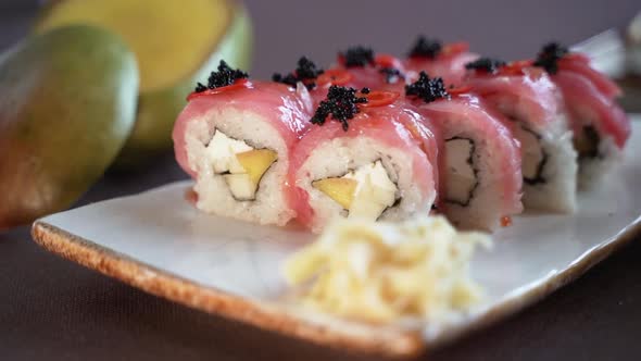 Sushi roll with tuna and mango