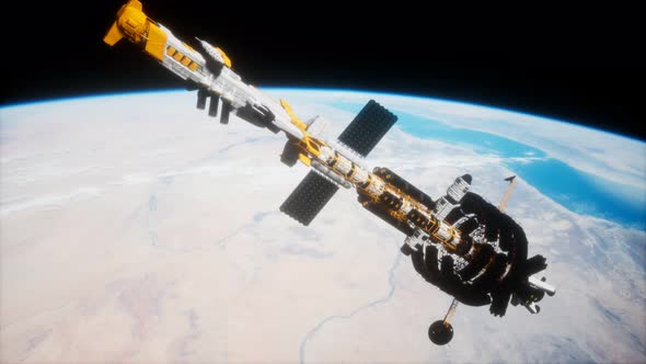 Big Spaceship on the Earth Orbit. Elements Furnished By Nasa alt