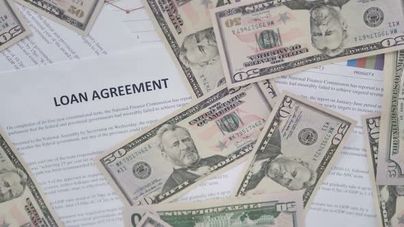 Scattered Dollars on Loan Agreement