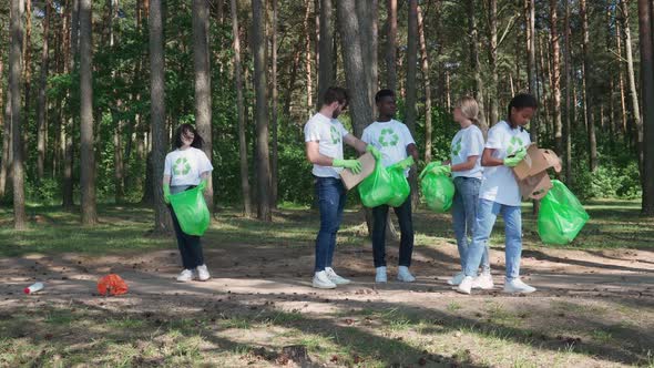 Ecoactivists and Volunteers Clean Up Garbage in the Forest Fight Against Plastic Pollution of Nature