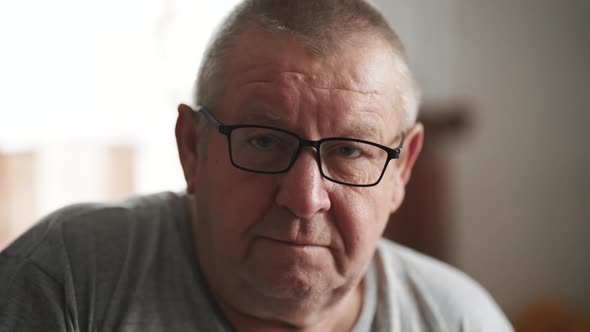 Portrait of an Elderly Man with Glasses