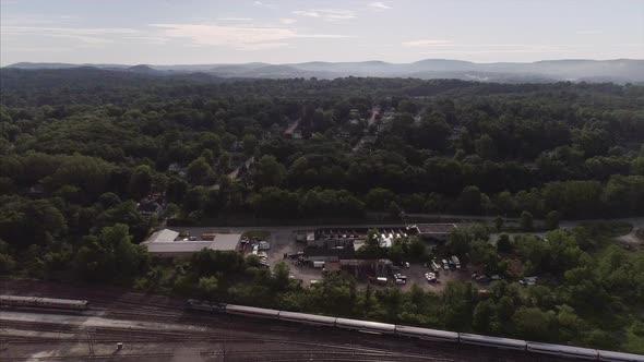 Birds Eye of Brewster New York, Moving Train is Seen From a Distance