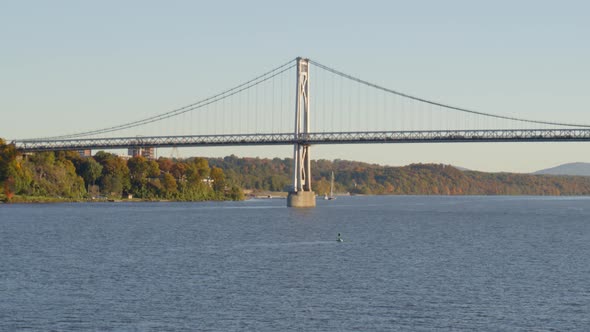 Low angle view of walkway and Mid-Hudson Bridge over Hudson river