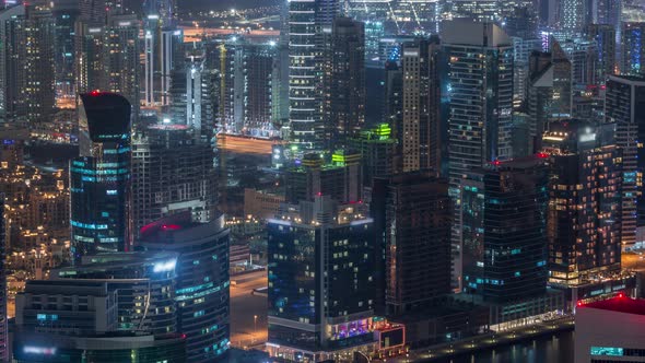 Panoramic Aerial View of Business Bay Towers in Dubai Night Timelapse