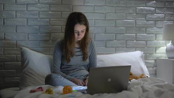 Exhausted Young Mother Falling Asleep in Front of Laptop, Lack of Leisure Time