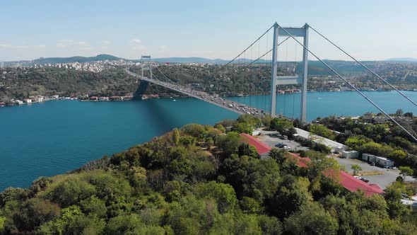 Aerial view of Fatih Sultan Mehmet Bridge and car traffic