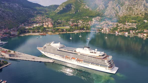 Big Cruise Ship in the Port of Kotor at Mountains Background Montenegro