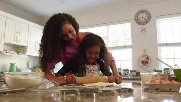 Family making Christmas cookies at home