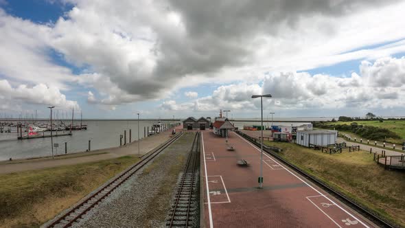 Time-lapse at the and of the railway in Langeoog, Germany. The opening of the season people coming o