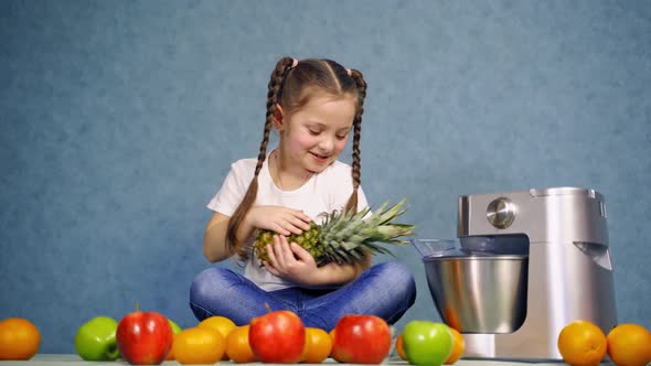 Little girl with fresh fruits