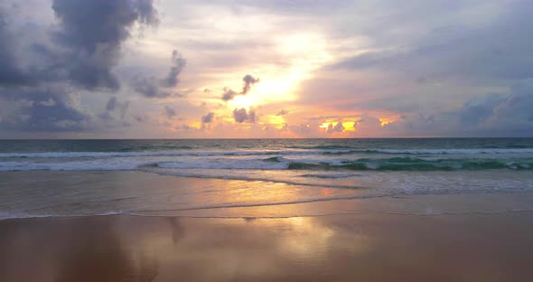 Amazing dramatic sunset sky on beach sand Andaman sea South of Thailand 4k Video Nature landscape be