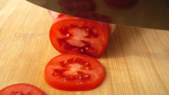 The Cook Cuts the Tomato 4