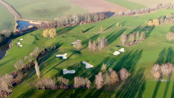 Aerial View of a Golf Course During Autumn Season