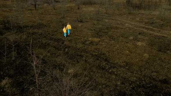 Ukrainian Girls in Clothes in the Colors of the Ukrainian Flag on the Ground