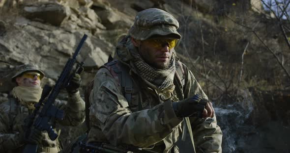 Soldier Taking a Break and Smoking alt