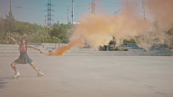 Beautiful Pin Up Woman Enjoying Figure Skating Rollerblading with Orange Smoke Bomb and Dancing