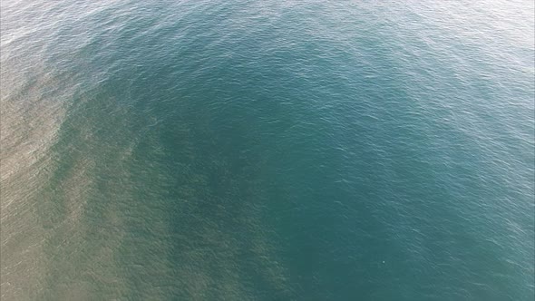 Flight over ocean by scenic Lofoten coastline