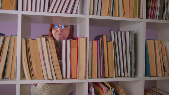 Portrait Brunettes with Trying to Find Books to Read