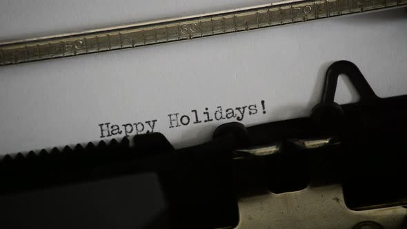 Typing the Expression Happy Holidays!  alt