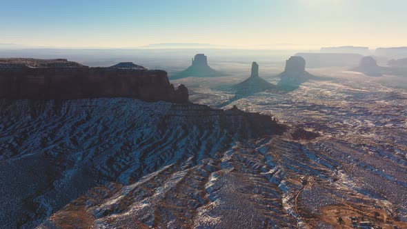 Cinematic Monument Valley Park on Sunny Winter Day with Fresh White Snow USA