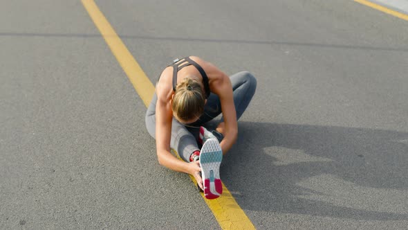 Handicapped Girl Stretching Legs on Road, Runner Warming After Workout