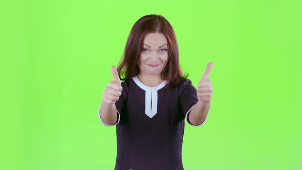 Lady Advertises the Products and Shows a Thumbs Up. Green Screen